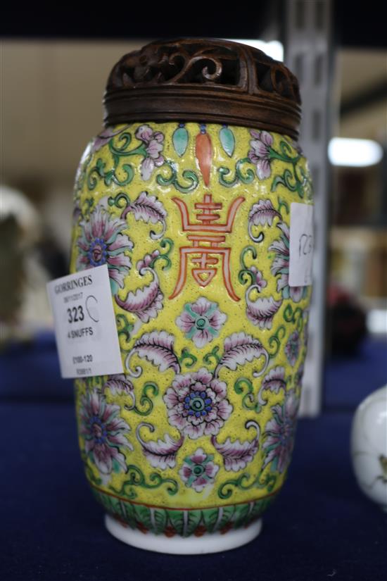 Three Chinese snuff bottles and a yellow ground Chinese vase